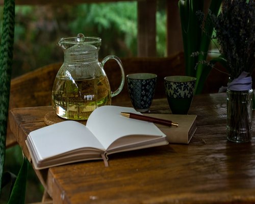 Cup of herbal tea and a book for relaxation and good lifestyle habits